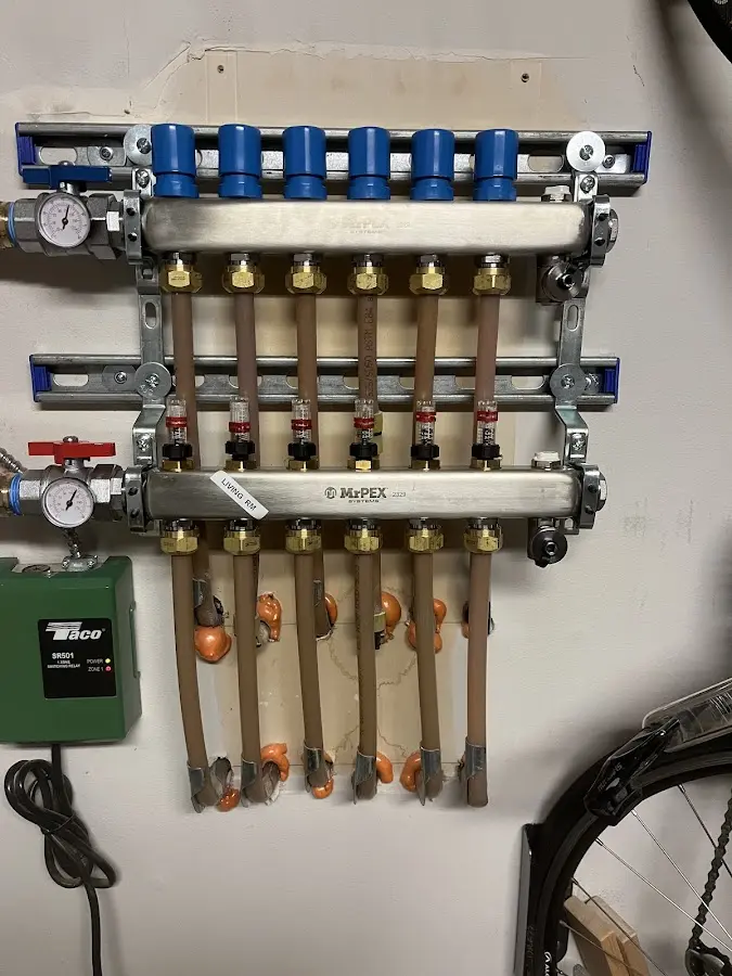 Plumber performing Gas Line Installation at a residential property in Savoy